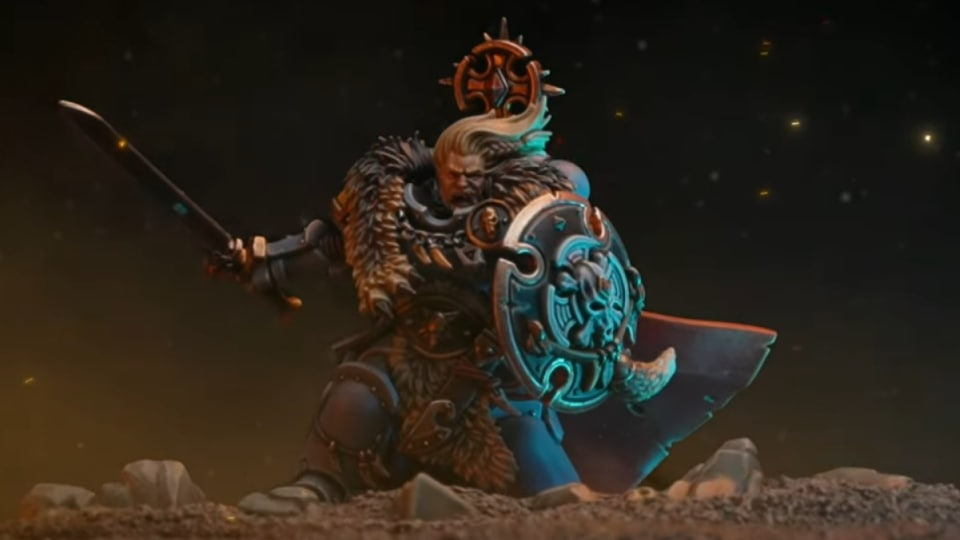 A man with an ornate shield, sword, and light blue armor, screaming on top of a dark battlefield.