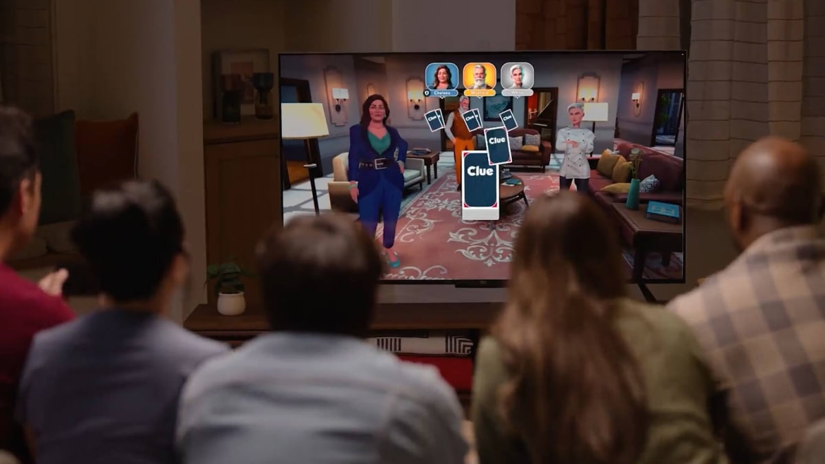 A family gathered around the TV and playing Clue on the new reworked Amazon Luna