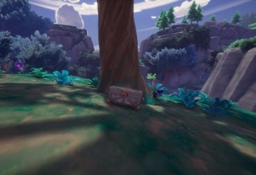 A treasure chest against a tree in the Elderwood in Palia