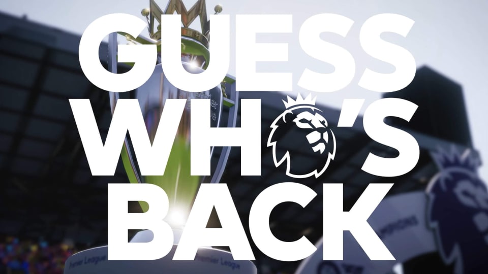 The Premier League trophy with "GUESS WHO'S BACK" in front of it