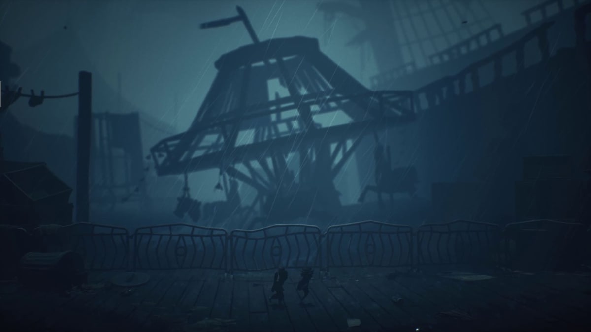Low and Alone sneak around a merry-go-round in Little Nightmares 3