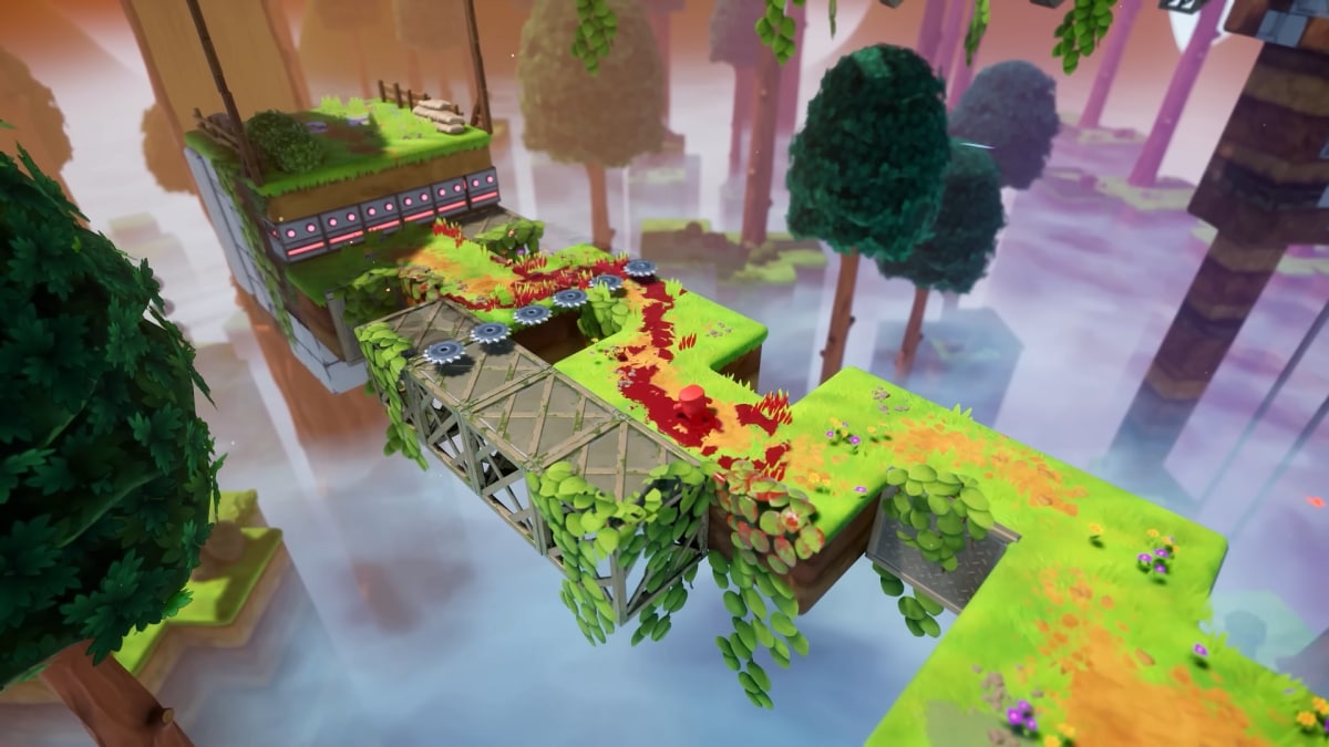 Meat Boy running along a path with saw blades flying at him.