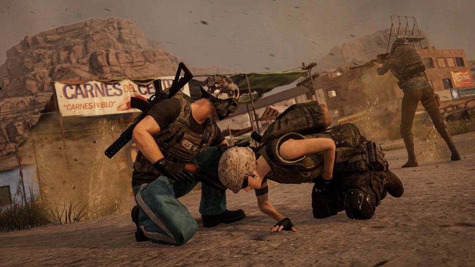 A player helping another player up in PUBG