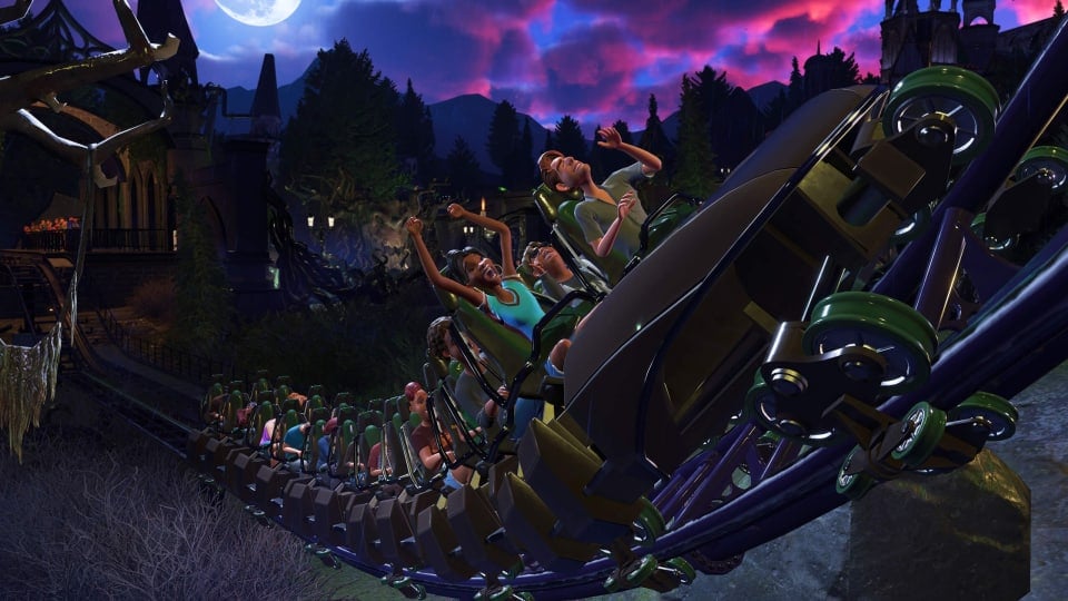 Park guests riding one of the new rides in the Planet Coaster 2 Sorcery Pack DLC