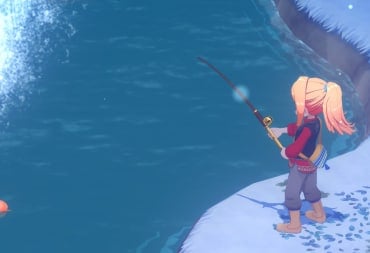 Fishing near a waterfall in winter.