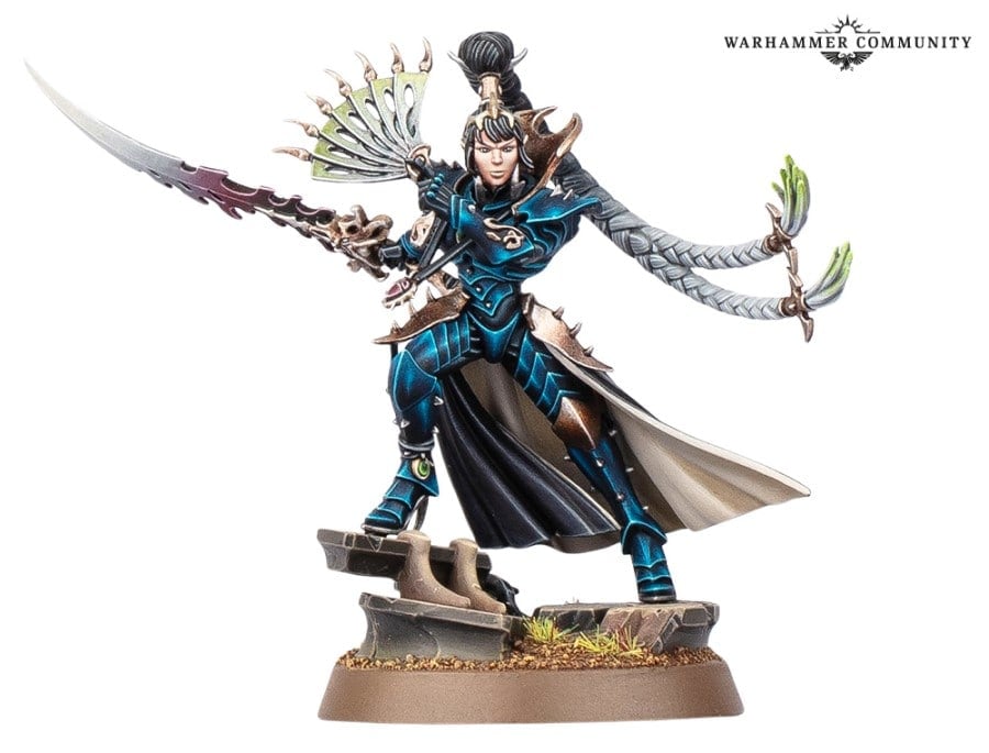 A miniature of a woman in a blue and black suit of sci-fi armor wielding a fan made of knives.