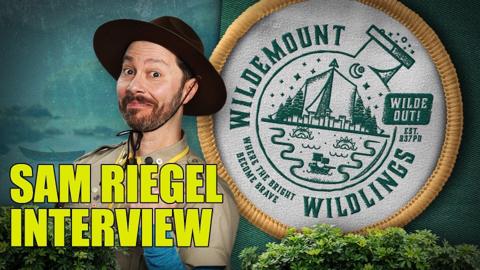 Sam Riegel and the logo for Wildmount Wildlings in camp attire